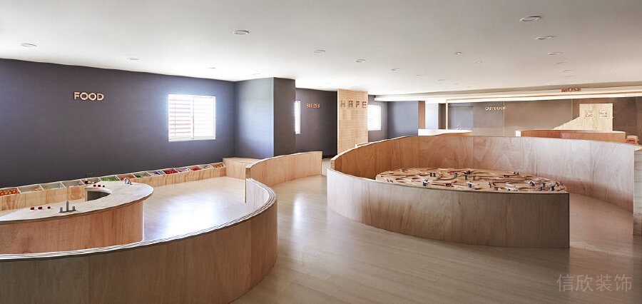 兒童培訓(xùn)機構(gòu)裝修設(shè)計弧形過道休息區(qū)