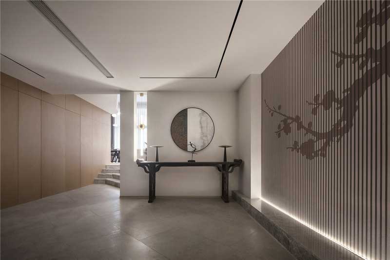 深圳龍華區(qū)現(xiàn)代中式風(fēng)格舊房裝修改造完工后實景圖玄關(guān)