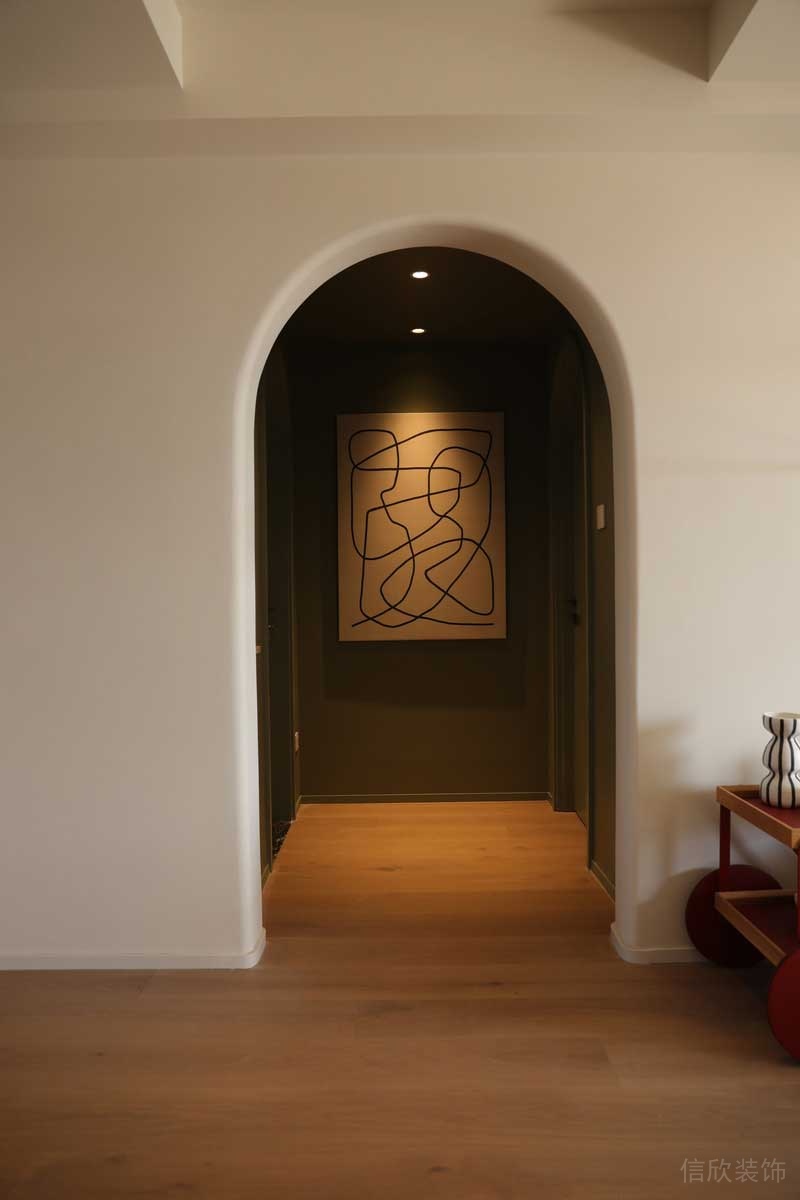 奶油風(fēng)客廳過道拱形門洞效果圖