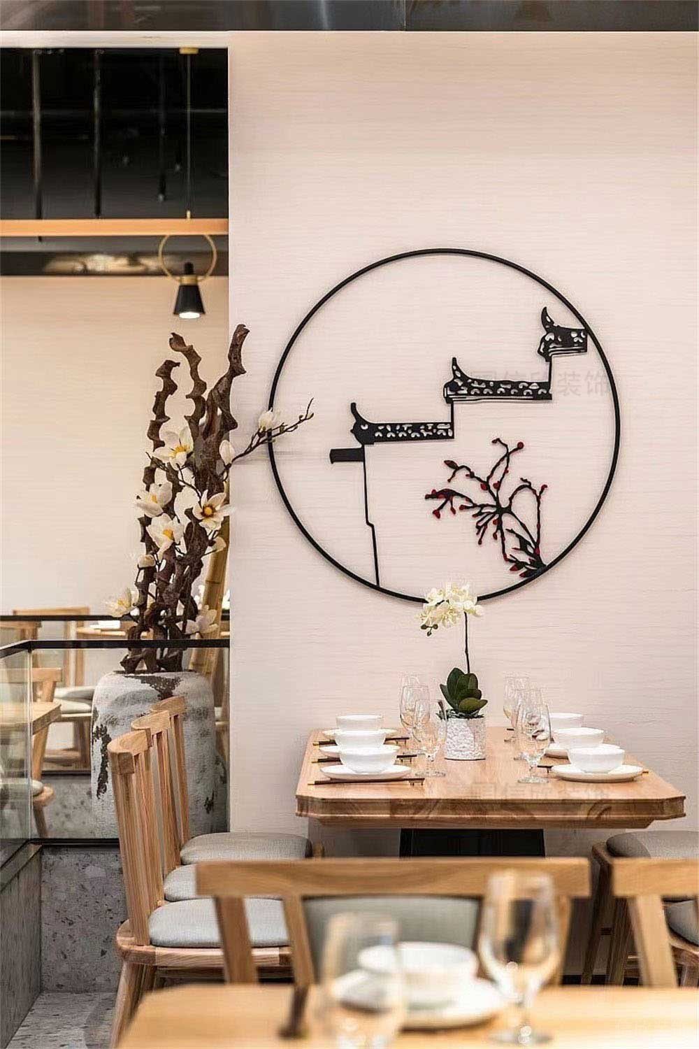 餐廳裝修墻面圓形的雕塑圖案設(shè)計(jì)圖