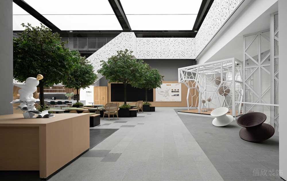 現(xiàn)代創(chuàng)意造型水磨石環(huán)形階梯木質(zhì)工作區(qū)辦公室過(guò)道裝修效果