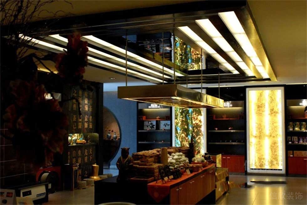 書店售賣區(qū)域茶葉裝修效果圖鎏金金屬暗色中式風店鋪裝修