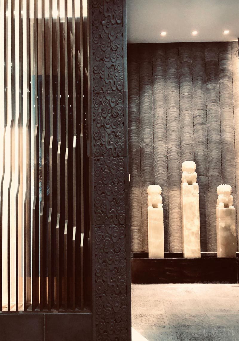 茶樓入戶門口古風(fēng)的墻面裝修圖