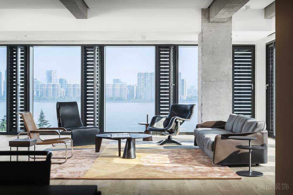 極簡風(fēng)辦公室接待區(qū)皮質(zhì)沙發(fā)效果圖設(shè)計