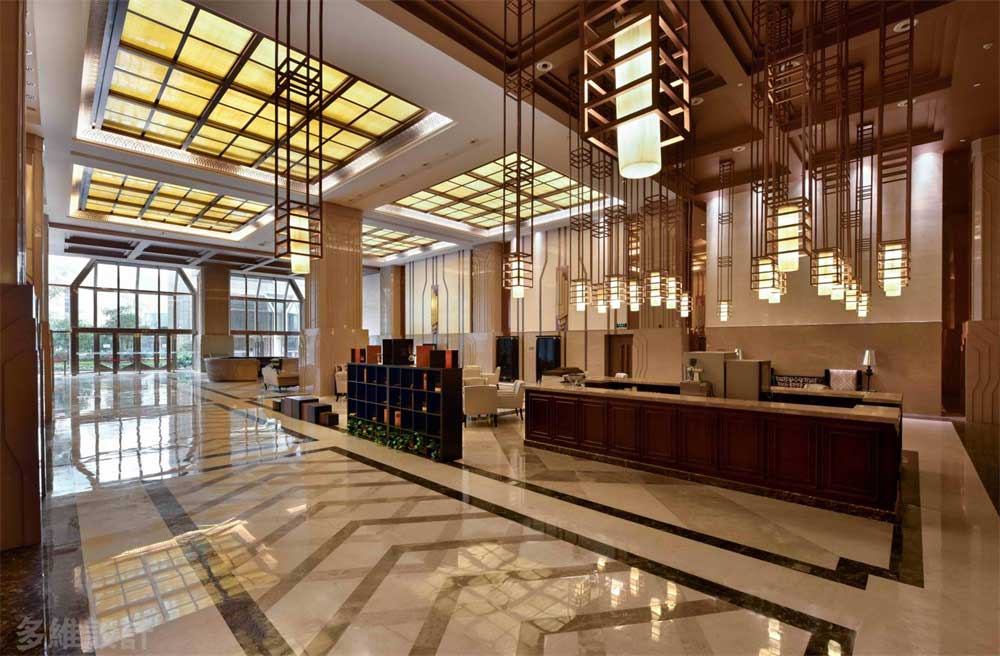 深圳寶安1000平方輕奢風格公司大堂裝修玫瑰金不銹鋼藝術(shù)吊燈