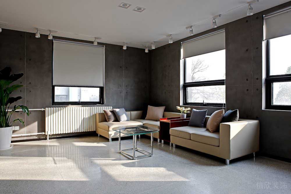 會客區(qū)商務(wù)風(fēng)現(xiàn)代簡約灰色墻體沙發(fā)效果圖