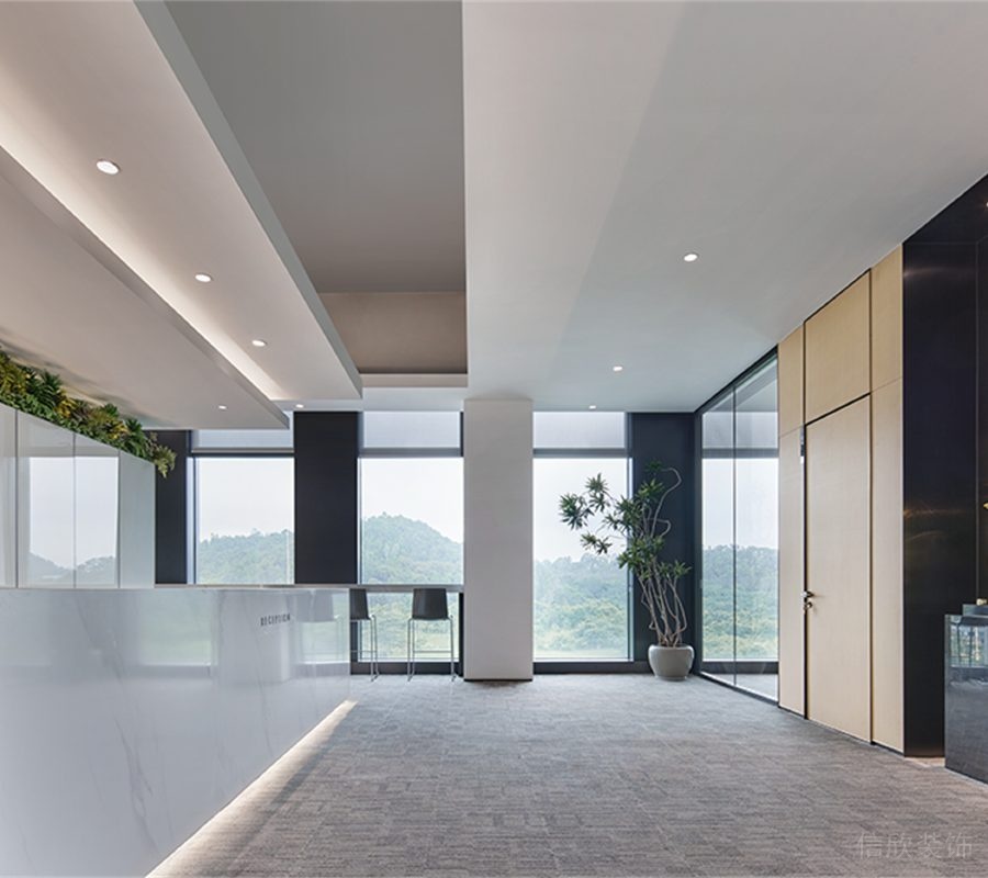 辦公室前臺(tái)區(qū)爵士白大理石前臺(tái)效果圖