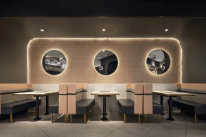 深圳龍崗榮超英隆大廈現(xiàn)代輕奢風(fēng)烤肉餐廳裝修案例卡座效果圖