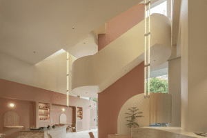 深圳羅湖新2000廣場(chǎng)極簡風(fēng)格甜品咖啡館裝修案例弧形樓梯效果圖