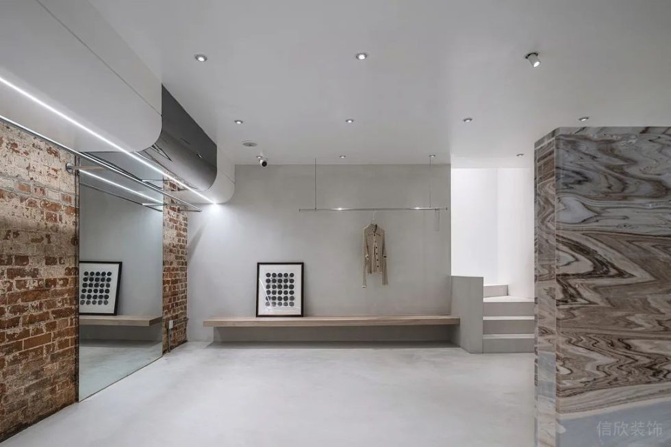 深圳市龍華去觀瀾現(xiàn)代風(fēng)服裝店裝修設(shè)計(jì)鏡面文化石背景墻 深圳市龍華去觀瀾現(xiàn)代風(fēng)服裝店裝修設(shè)計(jì)鏡面文化石背景墻