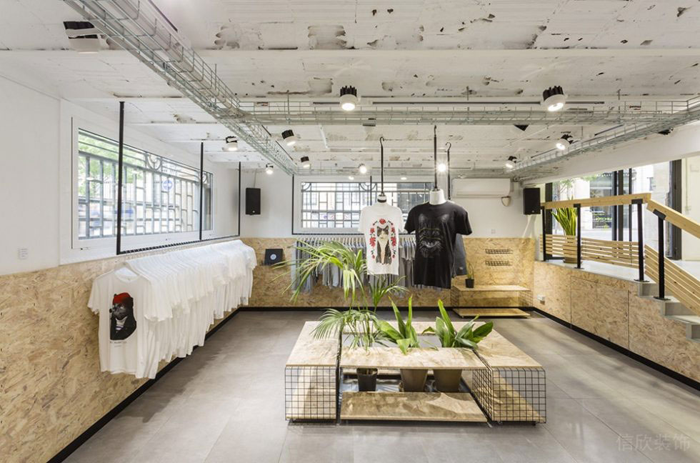 工業(yè)風(fēng)服裝店裝修粗礦的中島柜設(shè)計(jì)