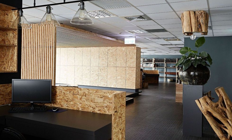 深圳寶安陽基九方廣場600平方米北歐工業(yè)風(fēng)公司裝修案例歐松板收納儲物柜