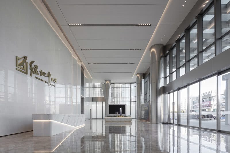 極簡輕奢風(fēng)格辦公室裝修設(shè)計(jì)方案 前臺(tái)大廳側(cè)面圖