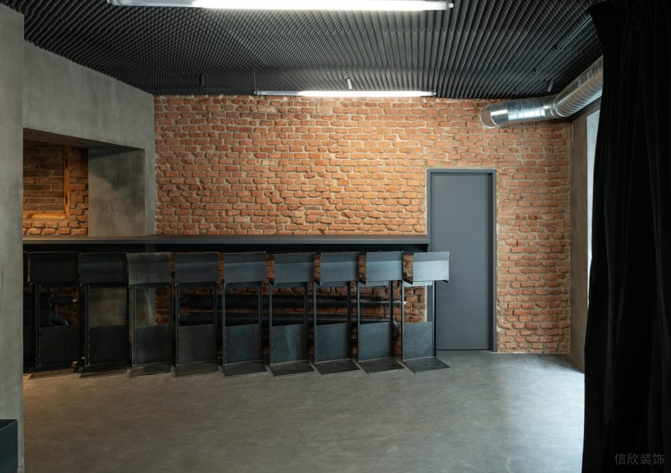 深圳龍華復(fù)古工業(yè)極簡風(fēng)酒吧入口卡座裝修設(shè)計