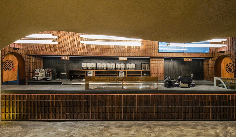 深圳南山區(qū)復(fù)古風茶室棕色前臺裝修設(shè)計