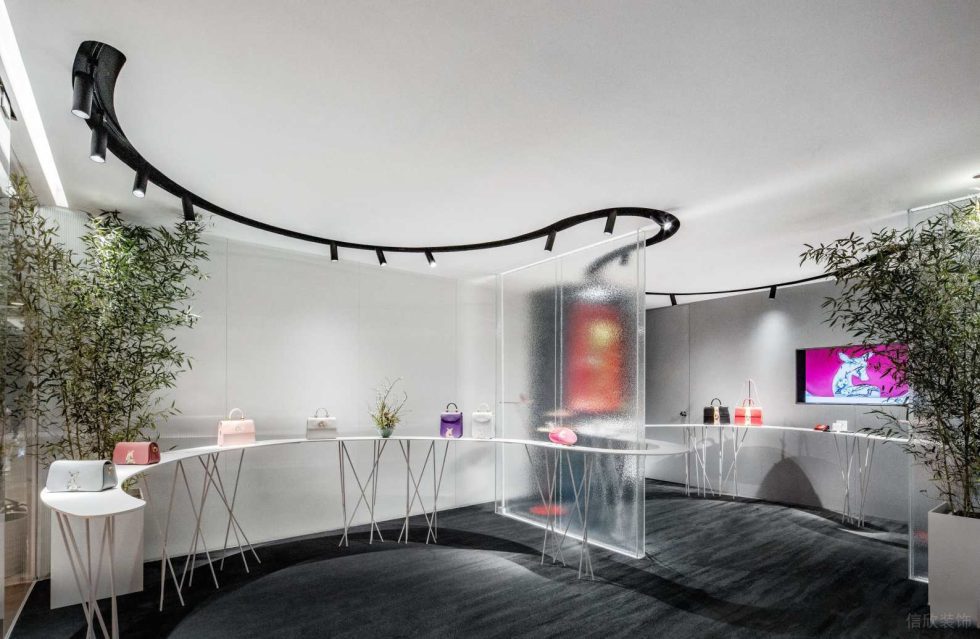 深圳市福田中心區(qū)皮革藝術(shù)形象店裝修設(shè)計(jì) 半圓弧藝術(shù)展臺(tái)