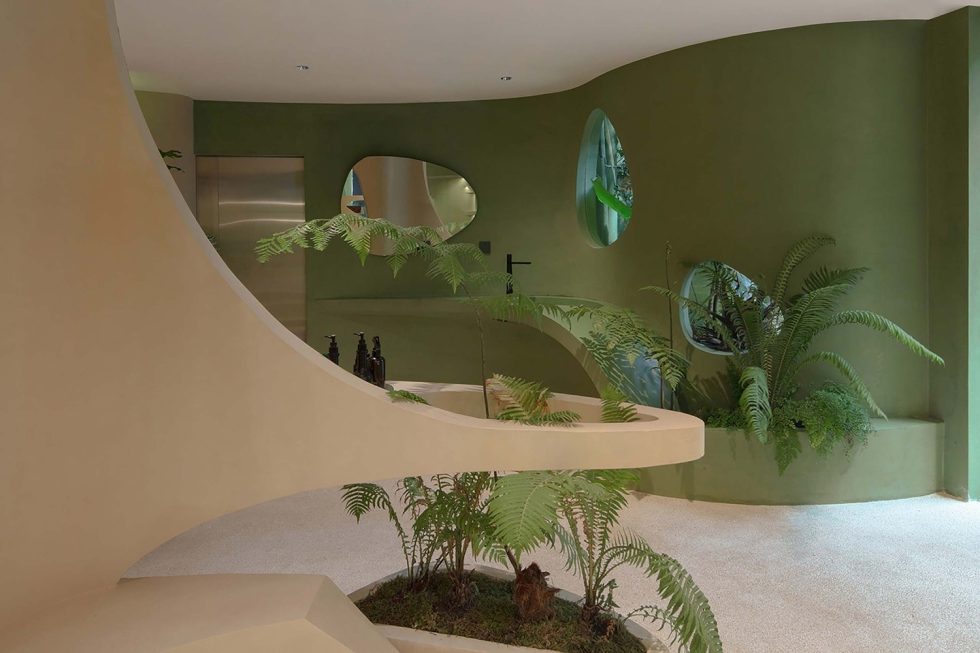 綠意奶油簡約風(fēng)飲品店綠色圓弧線條裝修效果圖