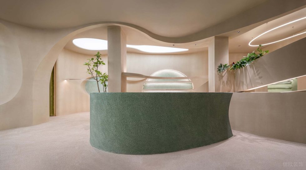 綠意奶油簡約風(fēng)飲品店杏色空間的綠色前臺(tái)效果圖