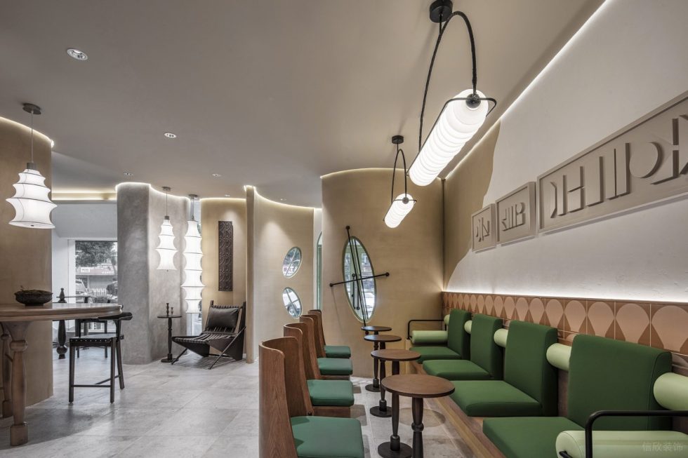 歐式清新飲品店綠色卡座區(qū)裝修設(shè)計