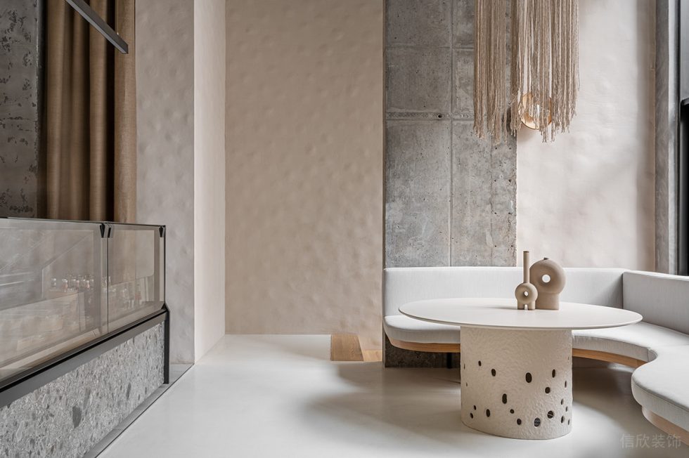 深圳市簡(jiǎn)約侘寂風(fēng)甜品店混凝土柱面裝修效果圖