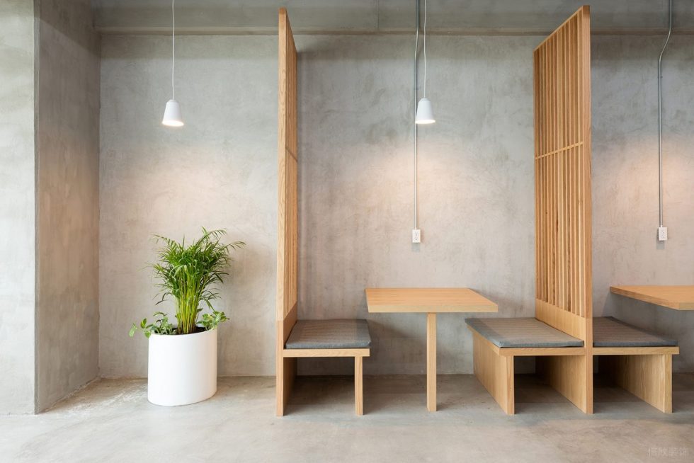 原木工業(yè)風辦公室裝修設計原木色卡座休息區(qū)