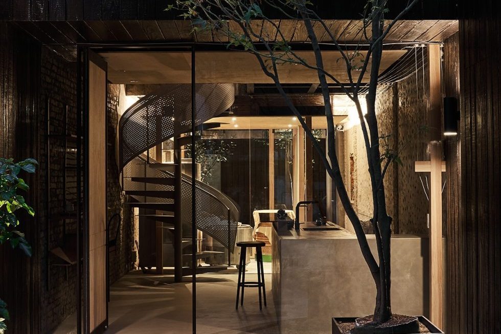 工業(yè)風茶室開放式入口處裝修圖