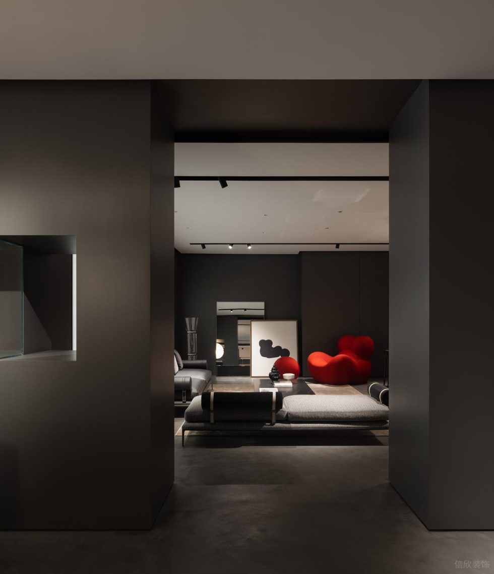 沙頭角現(xiàn)代簡(jiǎn)約風(fēng)展廳裝修案例 灰色沙發(fā)紅色卡通大椅子