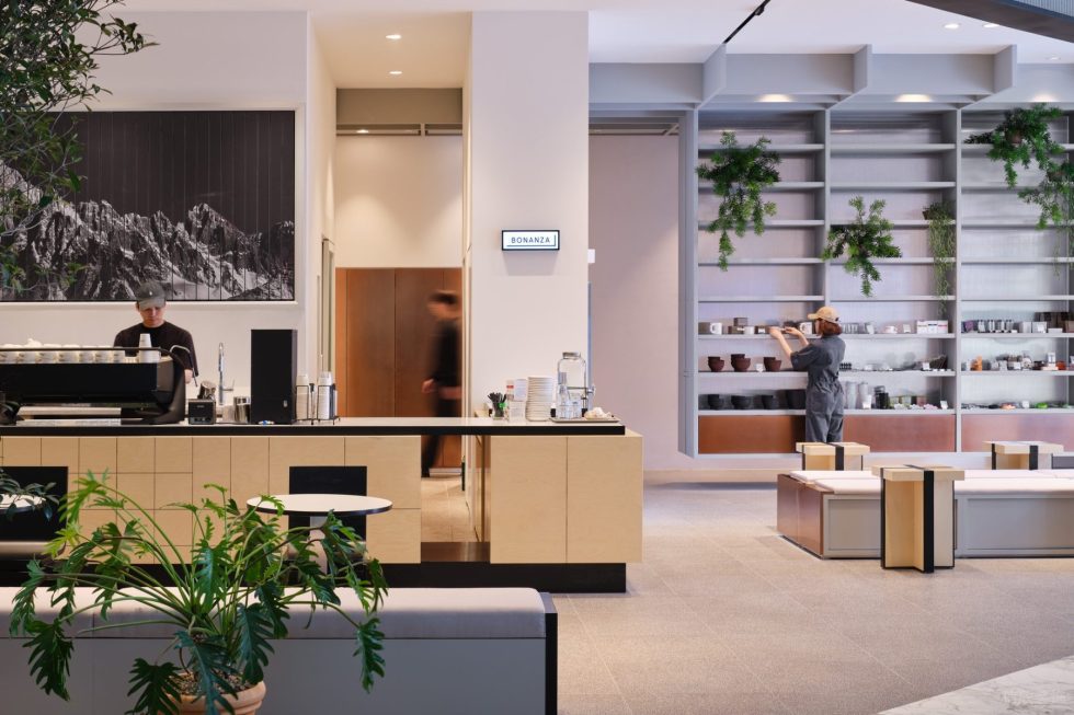 現(xiàn)代簡約風(fēng)咖啡廳水泥灰地磚裝修效果圖