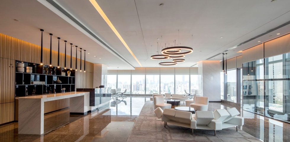 暖色調(diào)現(xiàn)代輕奢風(fēng)辦公室裝修設(shè)計暖白色會客廳