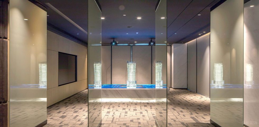 暖色調(diào)現(xiàn)代輕奢風(fēng)辦公室裝修設(shè)計暖灰色展廳