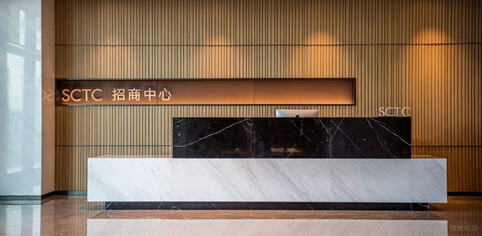 暖色調(diào)現(xiàn)代輕奢風(fēng)辦公室裝修設(shè)計黑白色大理石前臺