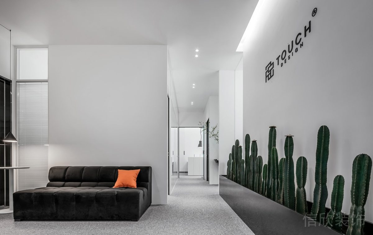 絨面布藝沙發(fā)仙人掌背景墻辦公室設(shè)計(jì)