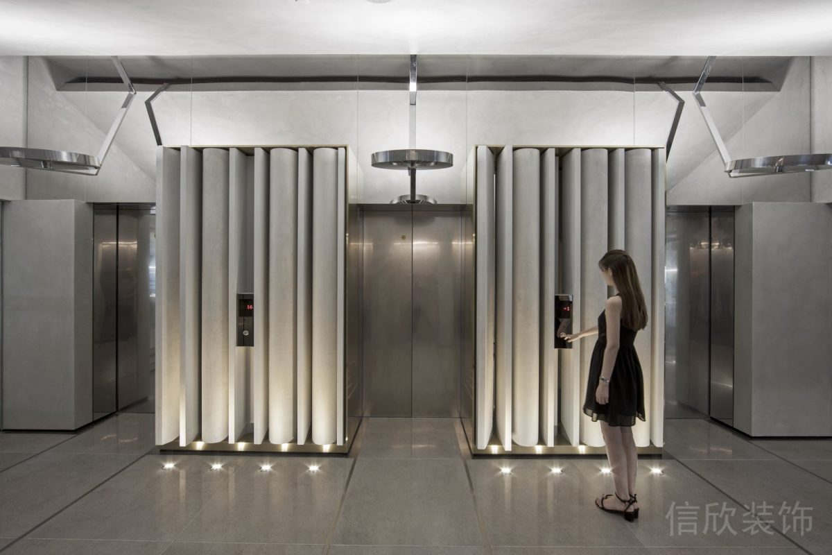 銀色金屬條紋電梯等待區(qū)裝修設(shè)計(jì)辦公室休息區(qū)