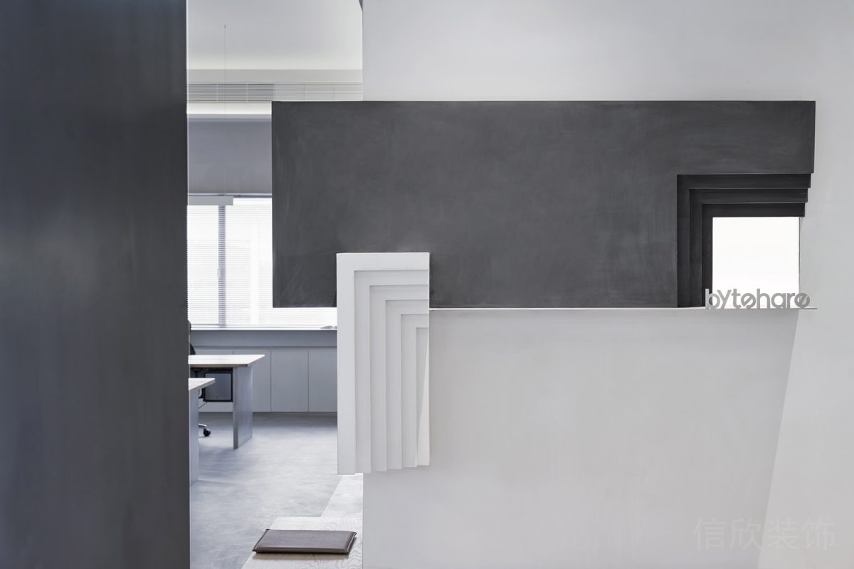 辦公室裝修灰色調(diào)設(shè)計(jì)幾何弧線設(shè)計(jì)前臺區(qū)效果