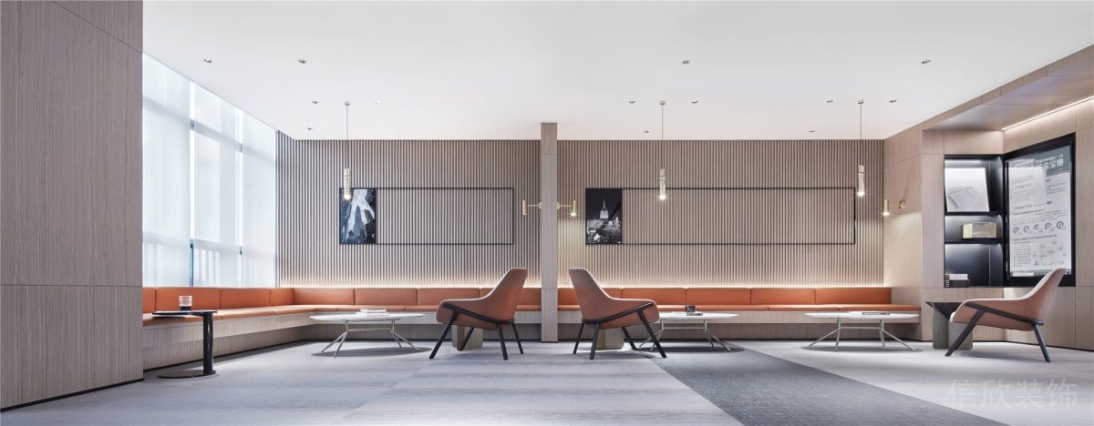 環(huán)形橙色沙發(fā)設(shè)計(jì)懸吊式銀色鋁合金射燈裝修辦公室員工休息區(qū)設(shè)計(jì)圖