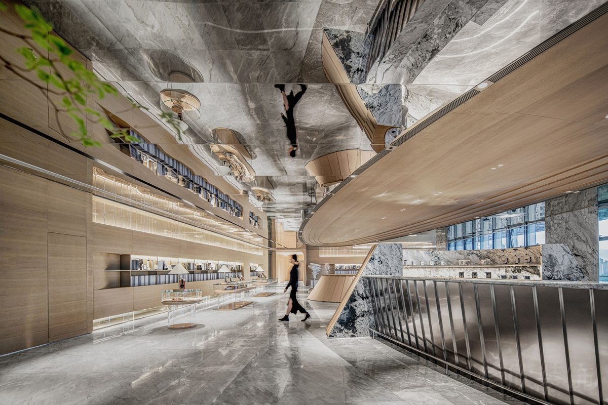 輕奢風(fēng)辦公室裝修灰色調(diào)墻體設(shè)計圓形效果金屬裝修過道鏡面地板